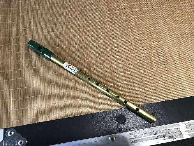 Brass whistle on a table at Guitar Center